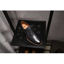 Zapatos casuales transpirables de cuero para hombres de nuevo estilo